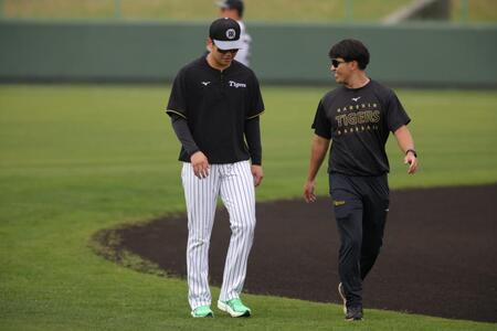 アップ中、ナインから離れる門別