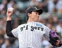 ７回を無失点に抑える阪神・湯浅京己＝甲子園（撮影・田中太一）