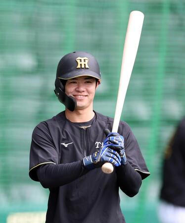 バットを手に笑顔を見せる中野（撮影・山口登）