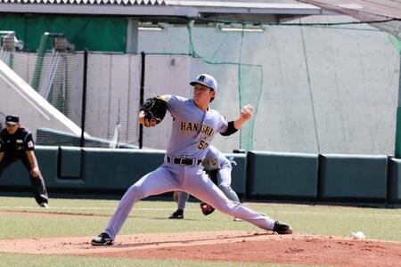 １回、力投する富田