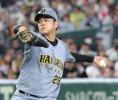 巨人打線を相手に力投する高橋（撮影・西岡正）