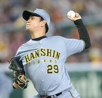 巨人打線を相手に力投する高橋（撮影・西岡正）