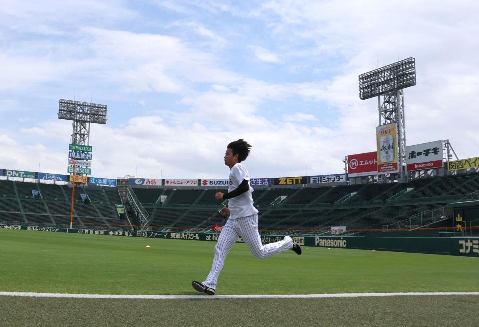 ランニングする高橋（撮影・山口登）