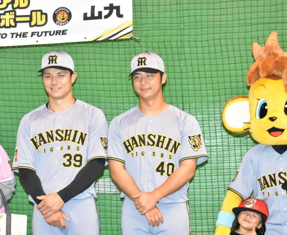 ファンと写真撮影で交流する栄枝