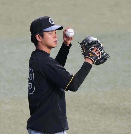 登板に向けて調整する高橋（撮影・立川洋一郎）
