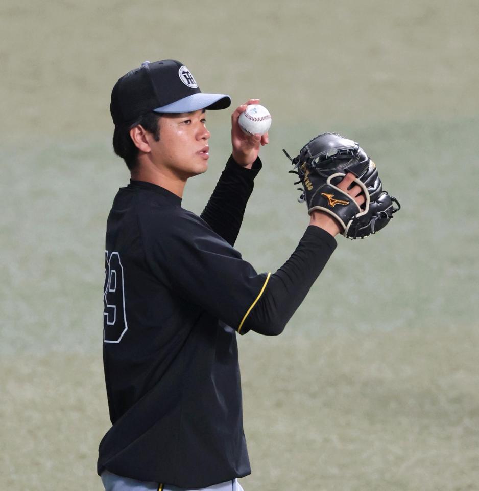 登板に向けて調整する高橋（撮影・立川洋一郎）