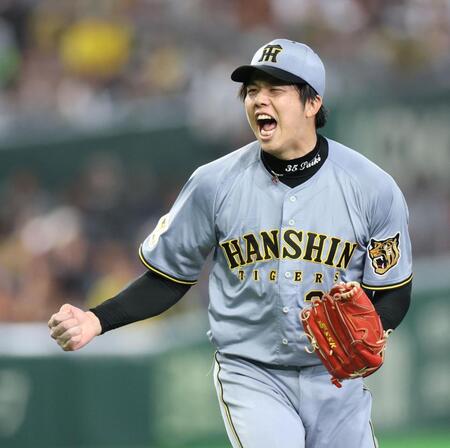 ６回、ダルベックから空振り三振を奪い、ほえる才木（撮影・伊藤笙子）