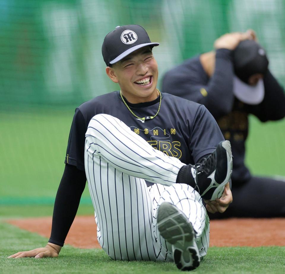 １軍に合流した百崎（撮影・西田忠信）