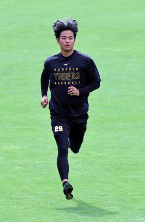 登板に向け調整する高橋（撮影・山口登）