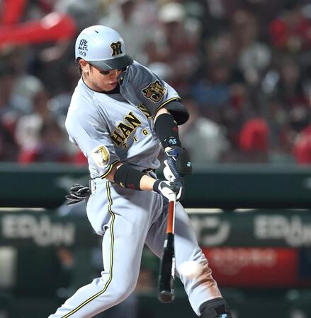７回、適時打を放つ梅野（撮影・北村雅宏）