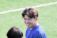 笑顔を見せる馬場