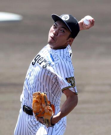 シート打撃の登板を終えた石井大智（右）＝撮影・山口登