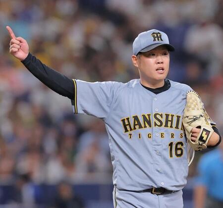 ２回、石川のスイングをアピールする西勇（撮影・西田忠信）