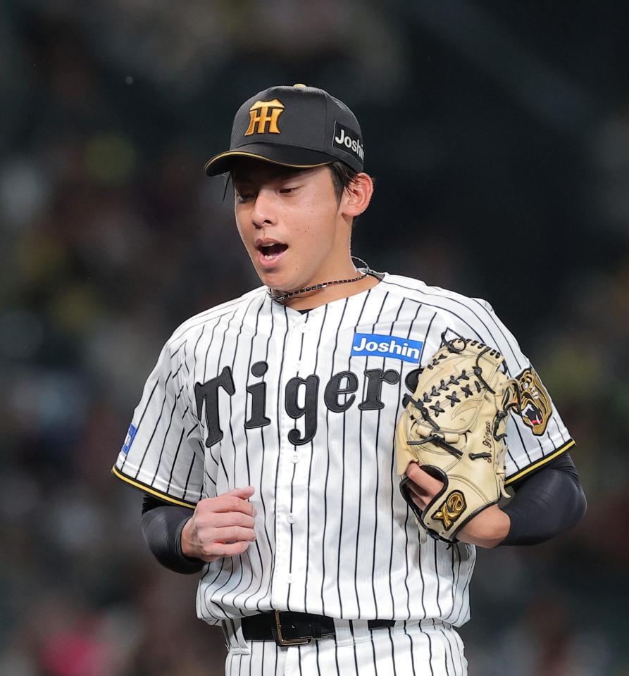 ５回を無失点に抑えベンチに戻る神宮（撮影・西田忠信）