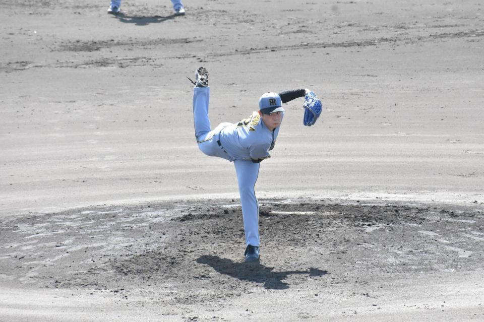 力投する下村