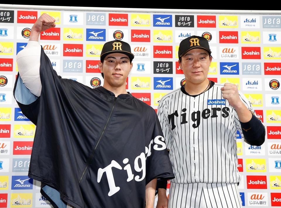 お立ち台でポーズを決める工藤（左）と大山（撮影・西田忠信）