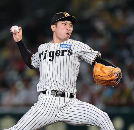 １１回、力投する阪神・石井大智＝甲子園（撮影・田中太一）