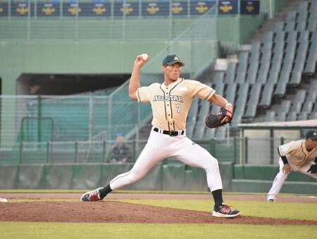 緊急登板で力投する糸井氏