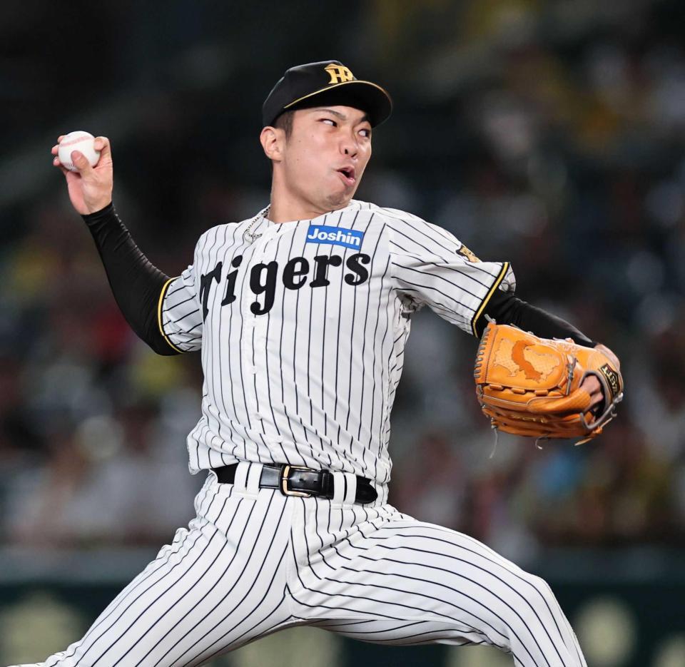 　１１回、力投する石井