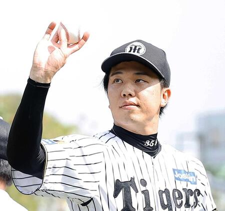 　登板へ向け調整する才木（撮影・西田忠信）