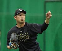 キャッチボールする桐敷（撮影・西田忠信）