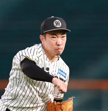 キャッチボールで調整する石井（撮影・西田忠信）