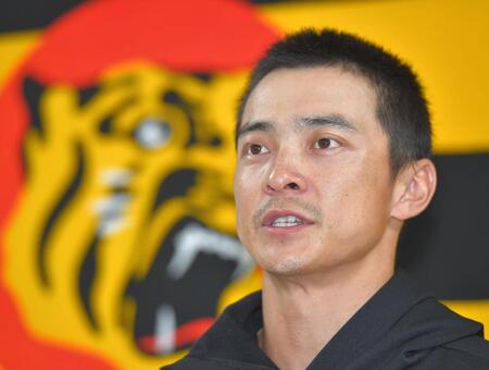 阪神への残留を表明し、会見する熊谷（撮影・出月俊成）
