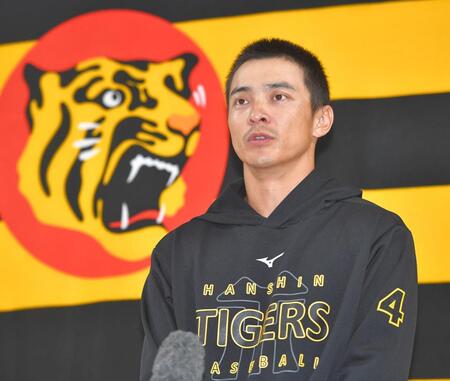 阪神への残留を表明し、会見する熊谷（撮影・出月俊成）